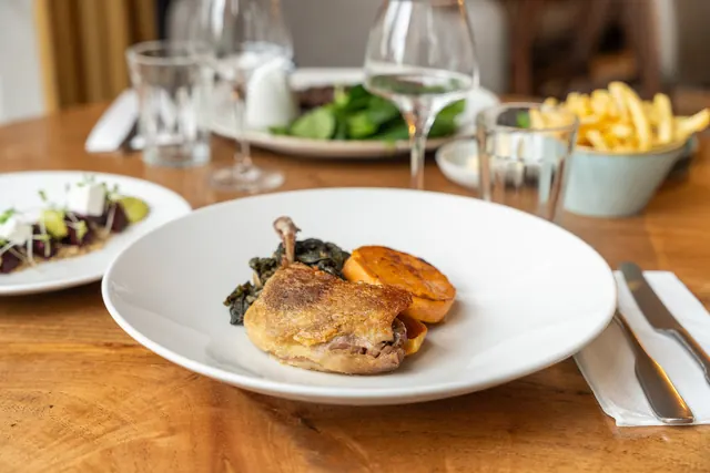Roast duck with seasonal vegetables